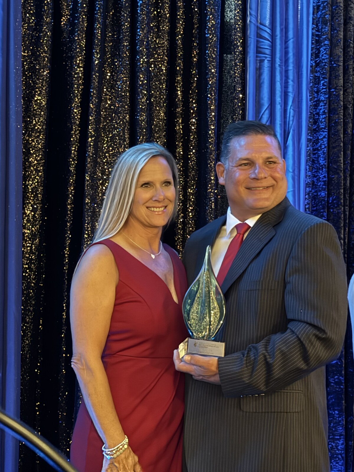 Lori and Mark Manyen receiving the 517 Magazine Entrepreneurial Spirit Award, October 2024