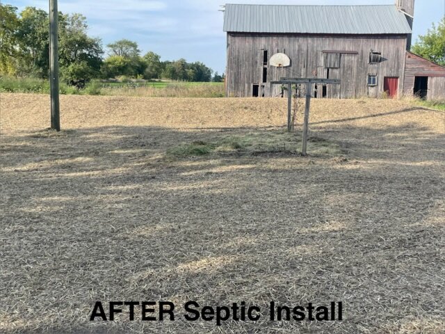 Septic install site reseeded and restored next to barn